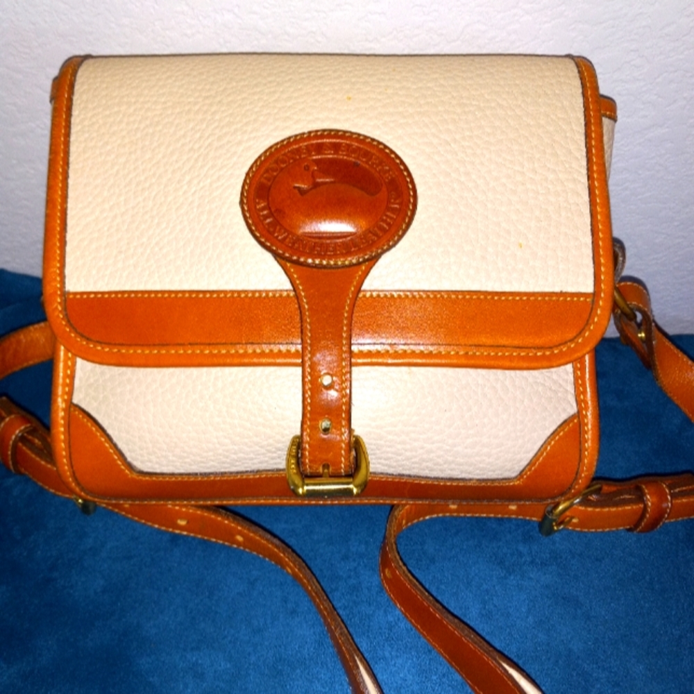 Dooney and Bourke vintage purse with strap.